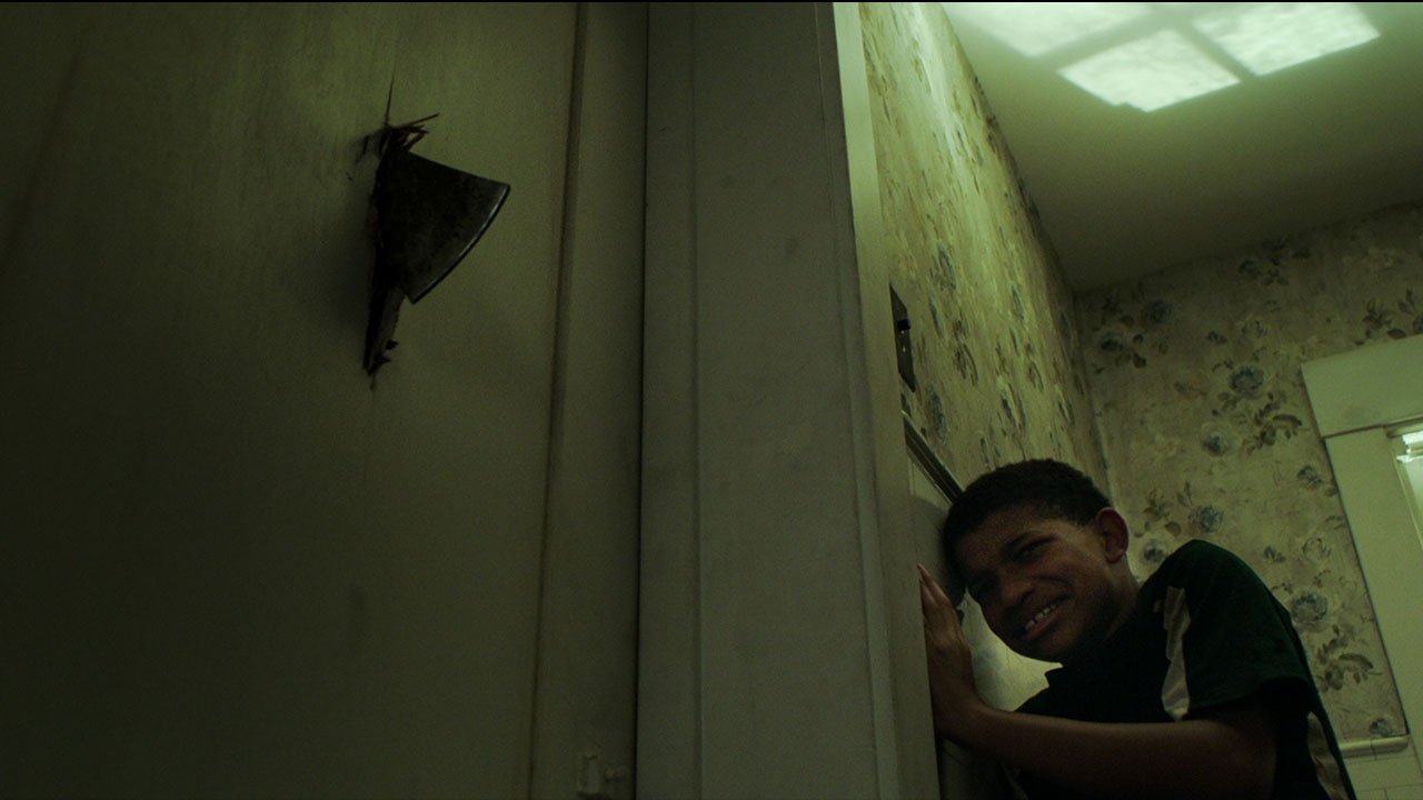 Still from THE BOY BEHIND THE DOOR